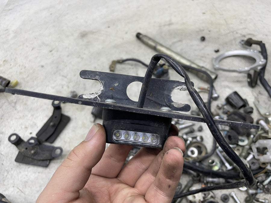 06-15 YAMAHA FZ1 PARTS AND HARDWARE LOT W/ BRAKE LIGHT