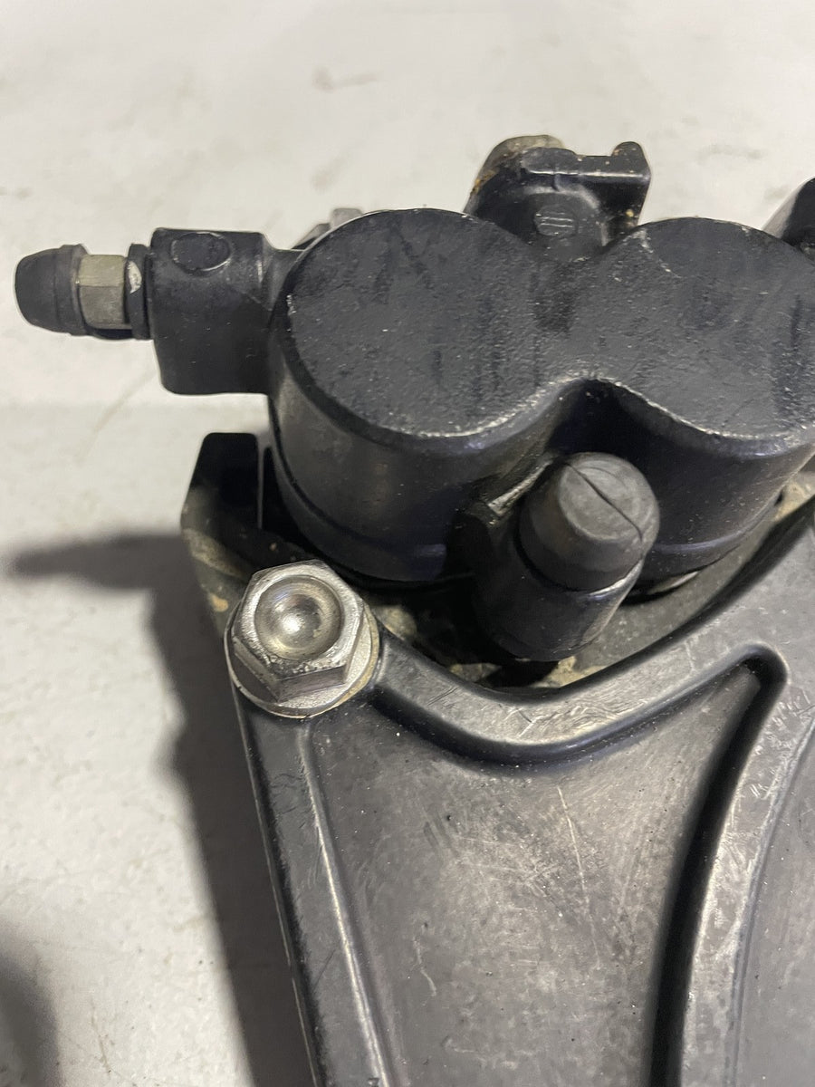 2006 TRIUMPH TIGER REAR BACK BRAKE CALIPER W MOUNT BRACKET
