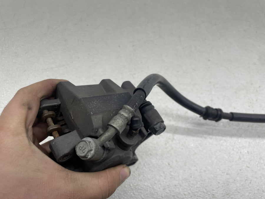 06-07 SUZUKI GSXR600 REAR BACK BRAKE CALIPER W/ BRAKE LINE