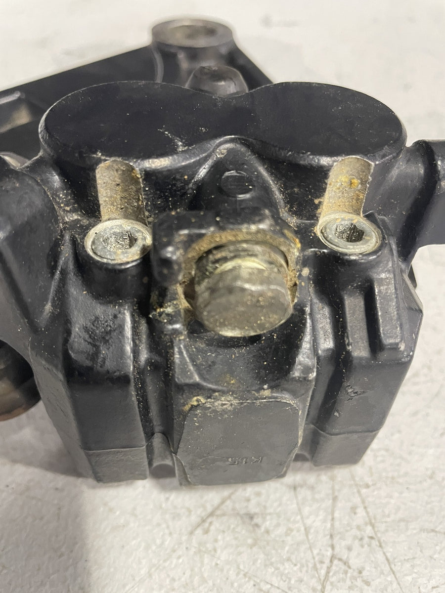 2006 TRIUMPH TIGER REAR BACK BRAKE CALIPER W MOUNT BRACKET