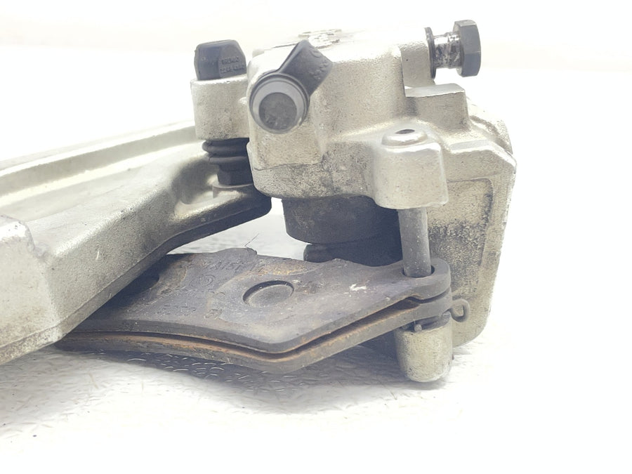 04-06 VICTORY KINGPIN BREMBO REAR BACK BRAKE CALIPER W MOUNT BRACKET 1910619