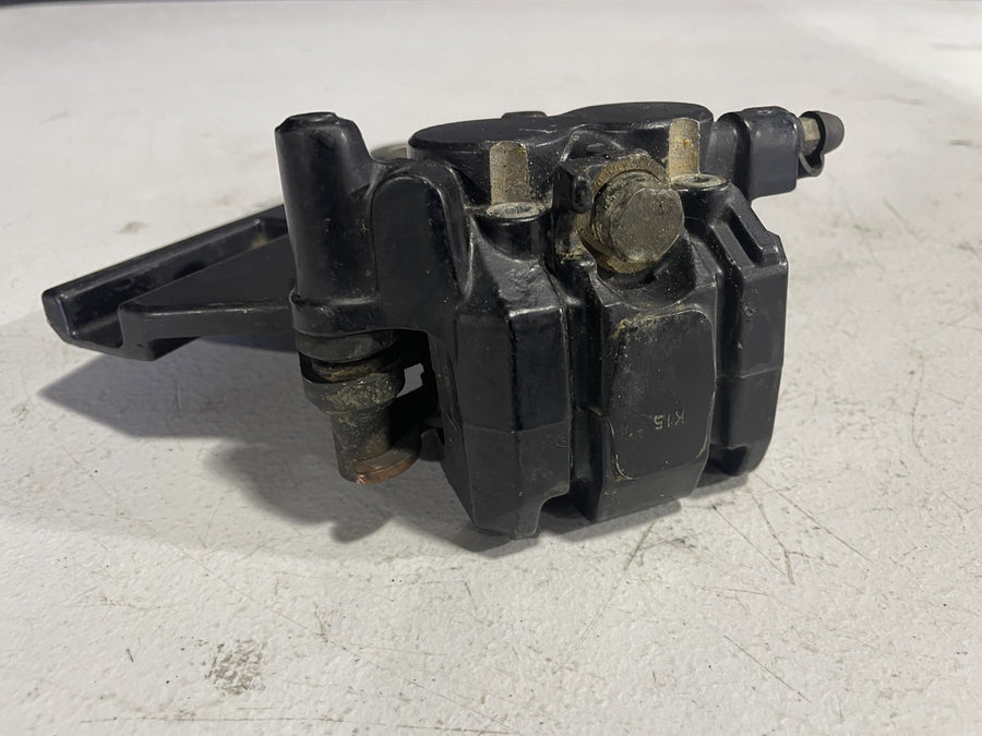 2006 TRIUMPH TIGER REAR BACK BRAKE CALIPER W MOUNT BRACKET