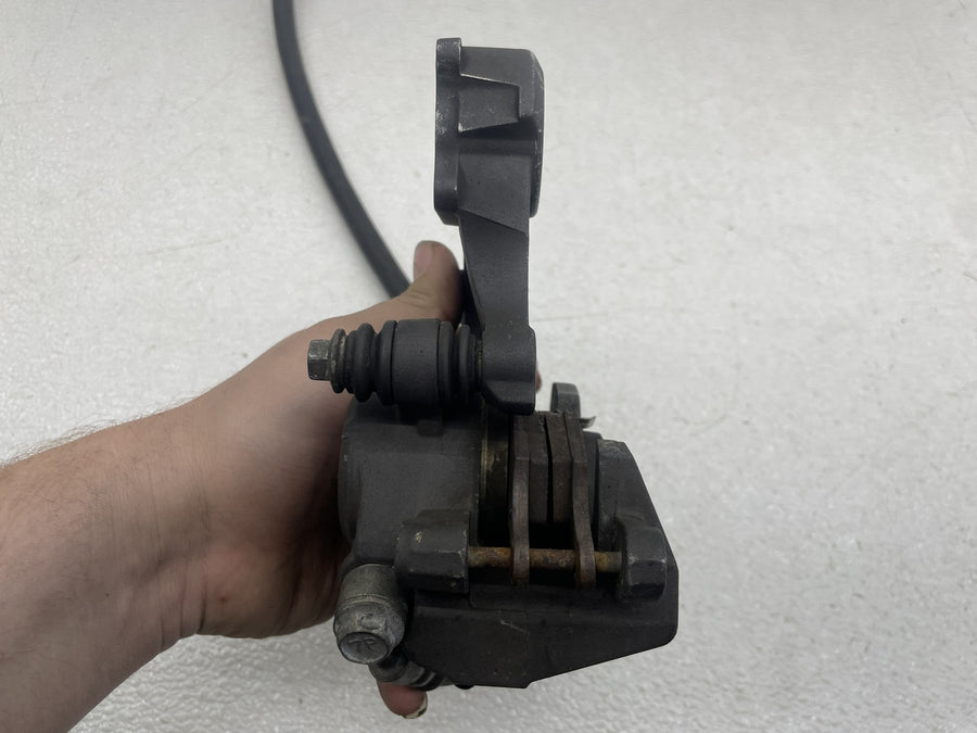 06-07 SUZUKI GSXR600 REAR BACK BRAKE CALIPER W/ BRAKE LINE